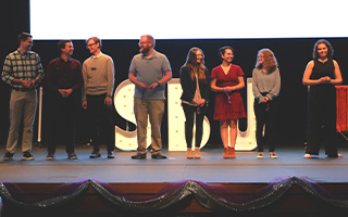 Students on stage during academic honors night