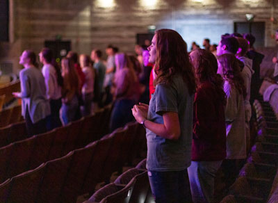 SBU students pray and sing during revival.