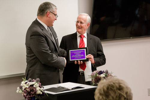SBU President Dr. Eric A. Turner honors Don Babb.