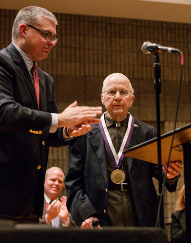 Dr. Ed Clark, founder of SBU's accounting program, is honored by SBU President Dr. Eric A. Turner.