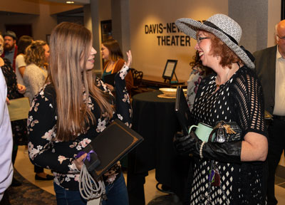 Amber Sorenson and Dr. Julie Bryant visit at a reception