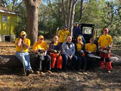 The SBU Diaster Relief team takes a break from cleaning up after Hurricane Michael.