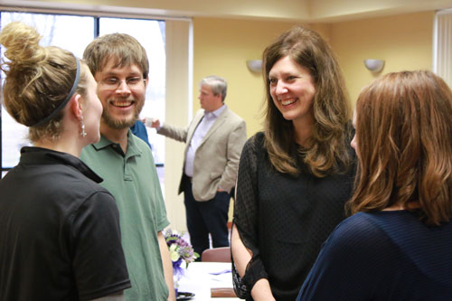Dr. Allison Langford visits with 2009 Honors Program graduates.