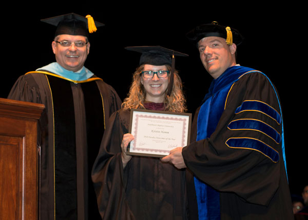 Kristin Hamm is presented with the 2018 Faculty Newcomer of the Year award.