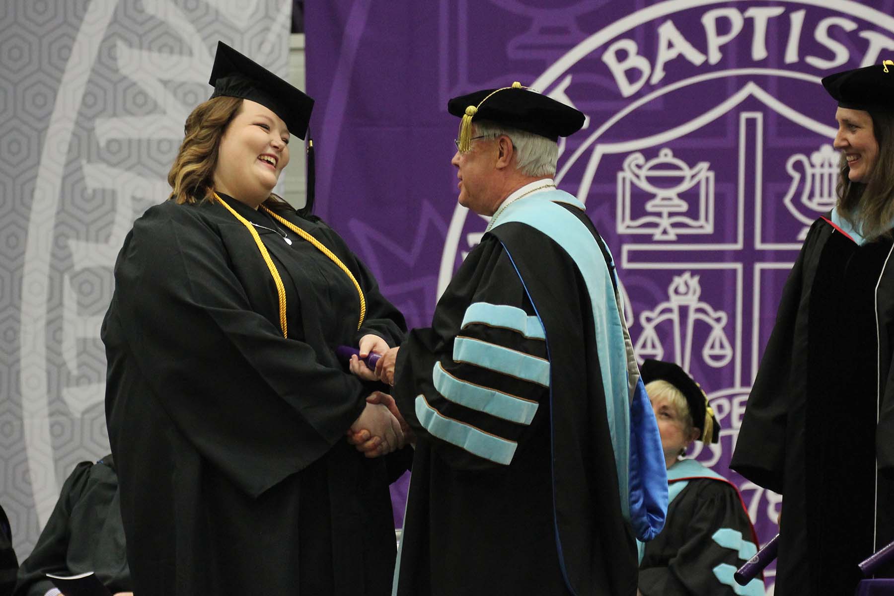 SBU graduate Patty Brandt recieves her diploma