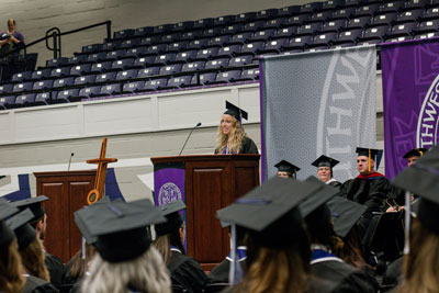 Stephanie Penticuff gives senior address from commencement stage