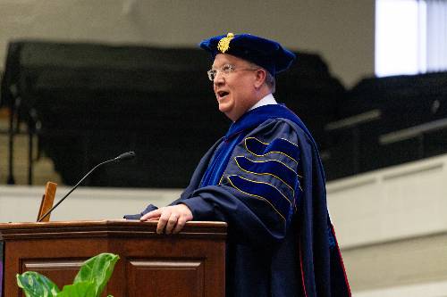 Dr. Rick Melson speaking at commencement ceremony