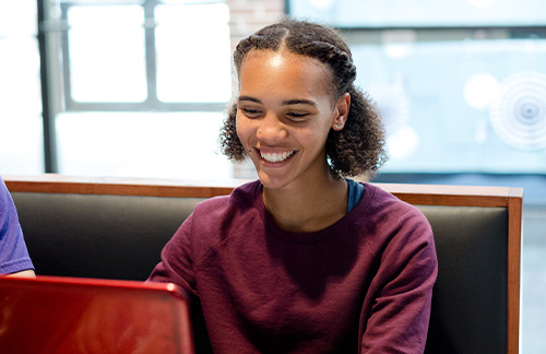 girl at computer in student union