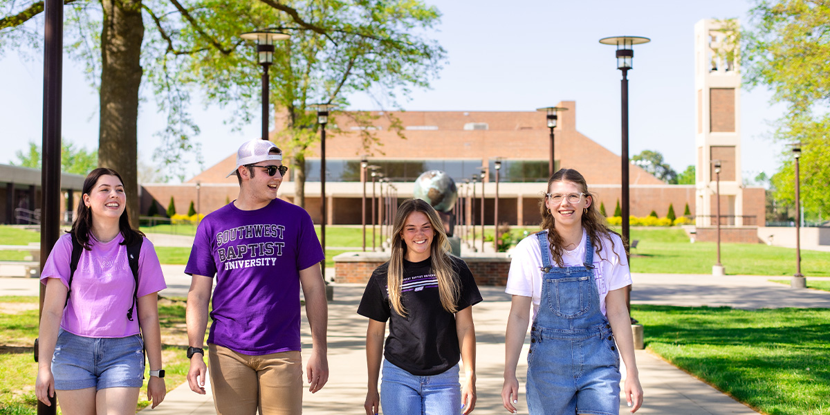 students walking on SBU campus
