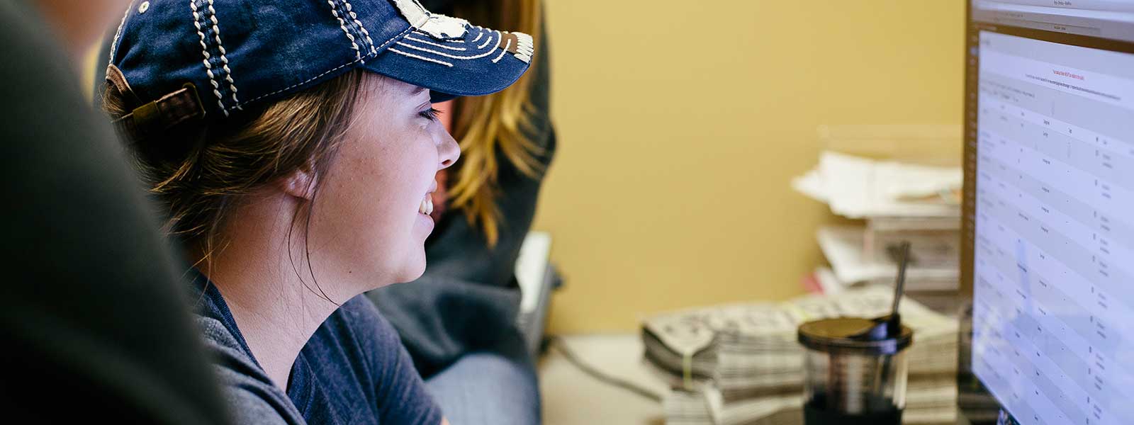 student working at desktop computer