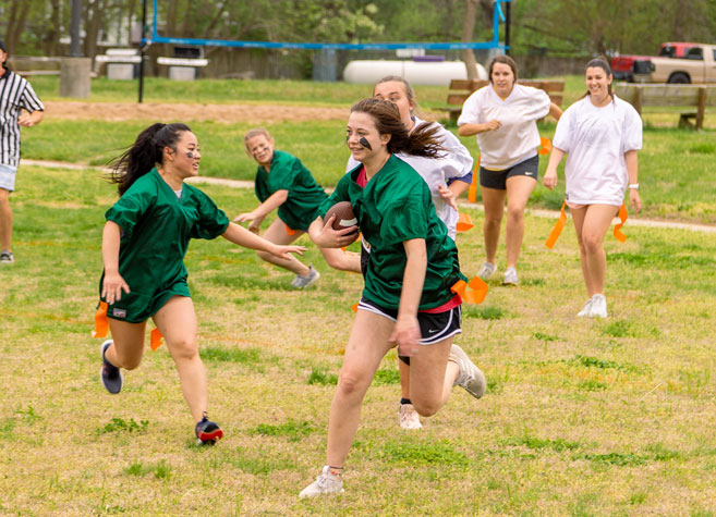 girls playing flag football