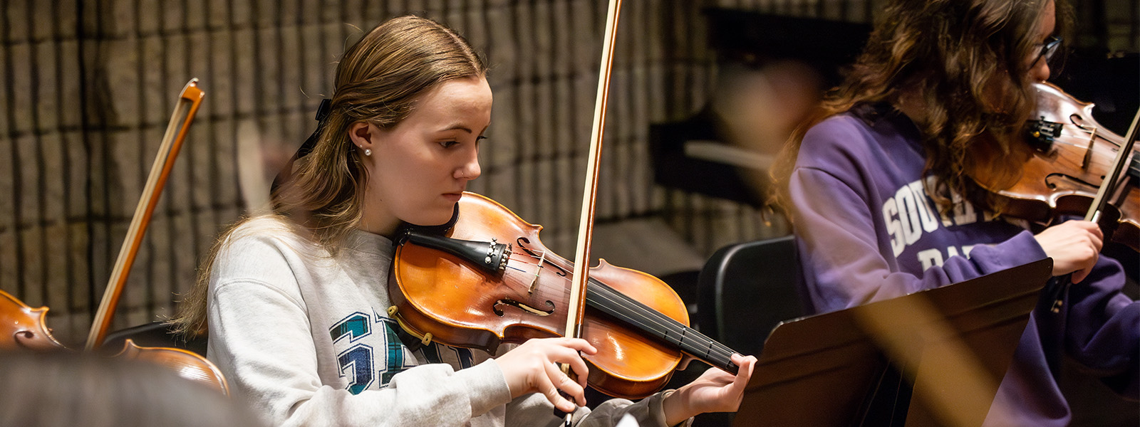 Choral and instrumental ensembles perform together