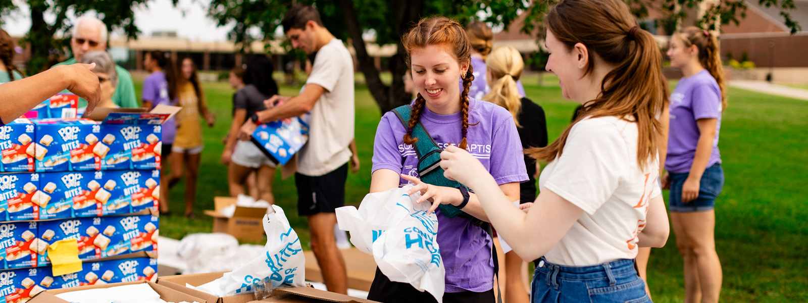 social work professor points to screen during class lecture
