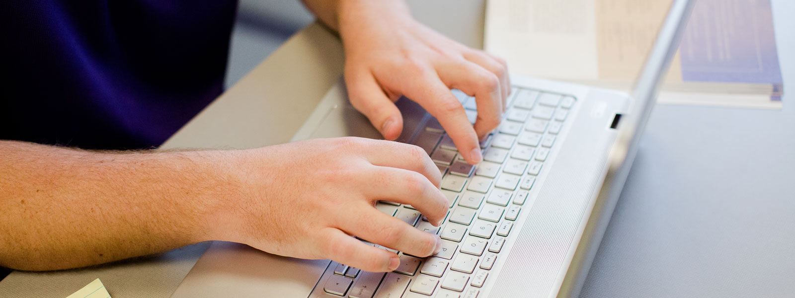 Four business students collaborate on project