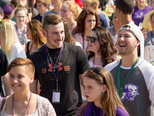 Smiling students walking