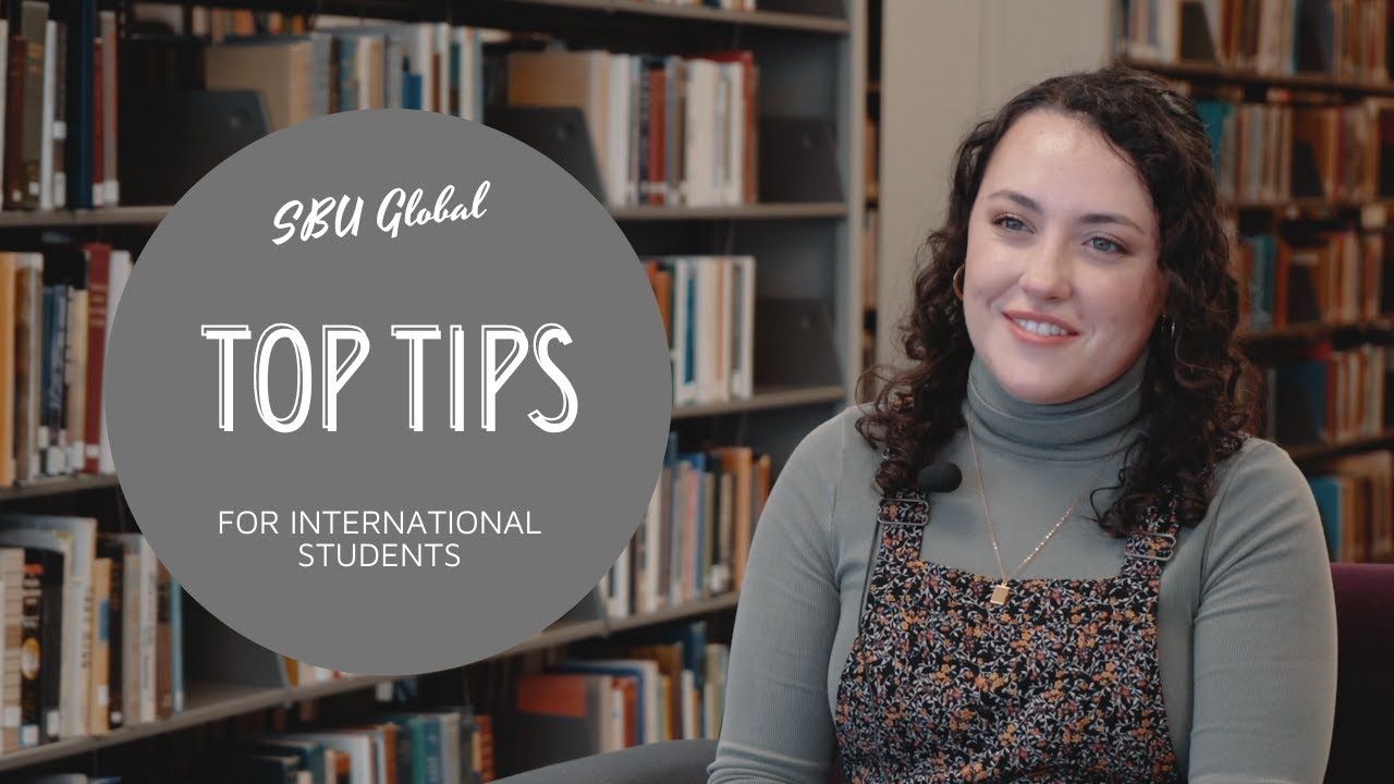 globe water sculpture with student union building in background
