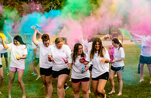 Students on SBU Bolivar campus doing color zumba together