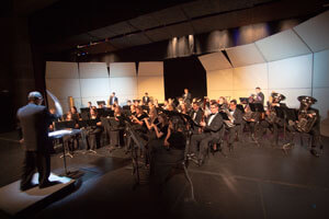 wind symphony performing on stage
